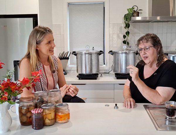 elle and katherine sitting down for an interview on learn how to can food